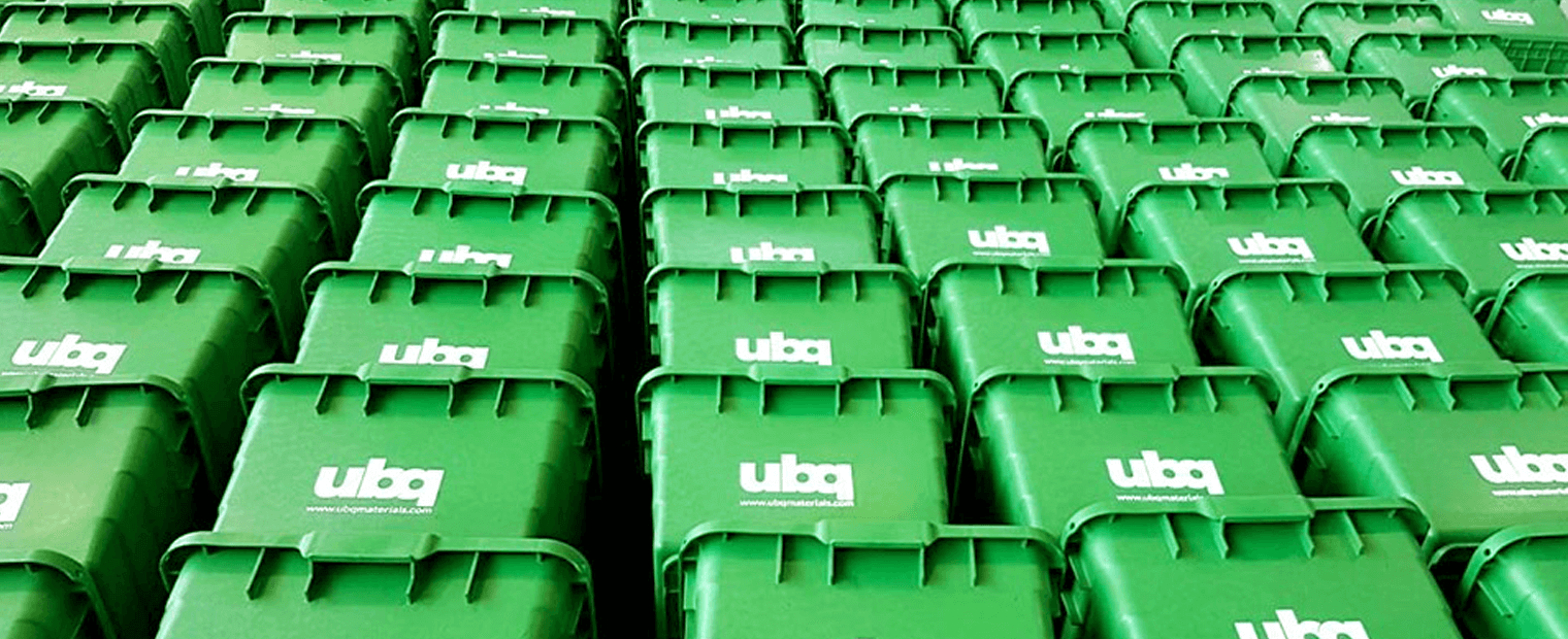 Rows of stacked green baskets made with UBQ materials.