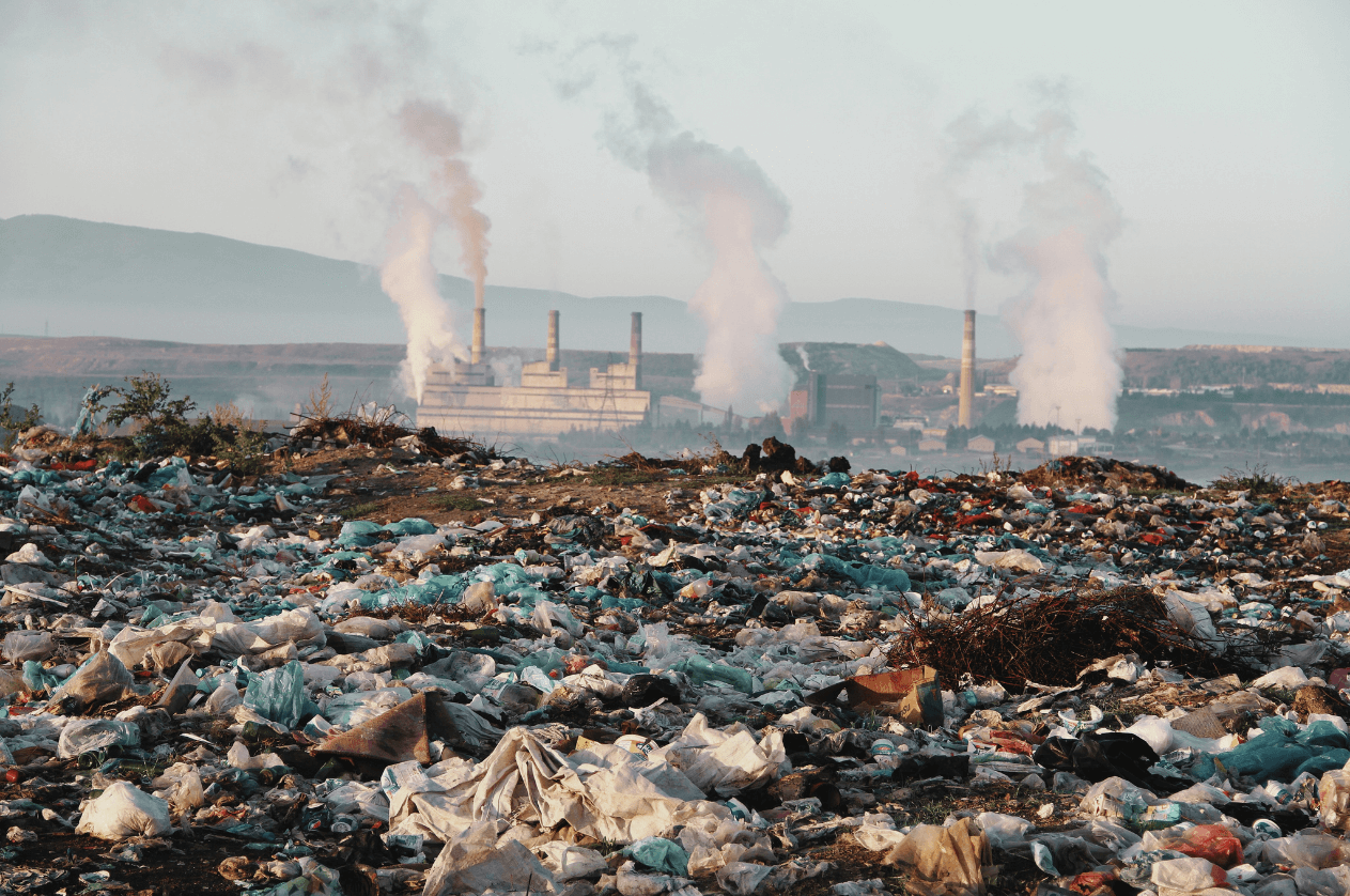 Methane factory surrounded by a landfill full of waste.