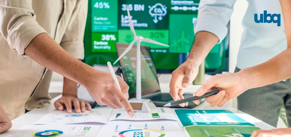 Various hands pointing down towards a carbon accounting report.